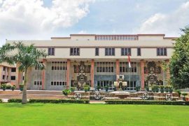 Administrative building at Delhi University amid controversy over separate vegetarian mess facilities petition.