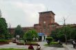 University of Delhi’s Faculty of Arts building, with students in the landscaped courtyard.