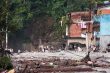 Flood damaged area in Nepal with debris on the road after severe floods.