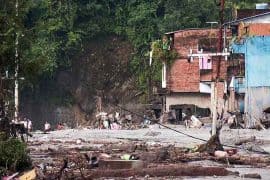 Flood damaged area in Nepal with debris on the road after severe floods.