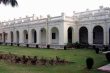 Exterior of the University of Delhi Vice-Chancellor’s Office, showing a long white building.