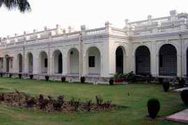 Exterior of the University of Delhi Vice-Chancellor’s Office, showing a long white building.